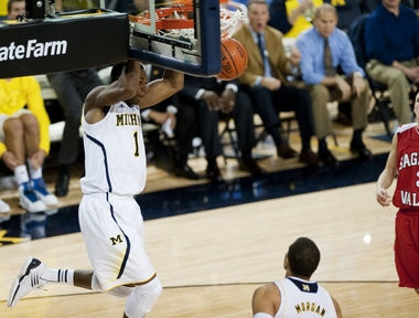 Glenn Robinson III (1) and Jordan Morgan (52)