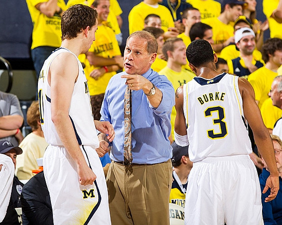 Nik Stauskas (11), John Beilein, and Trey Burke (3)