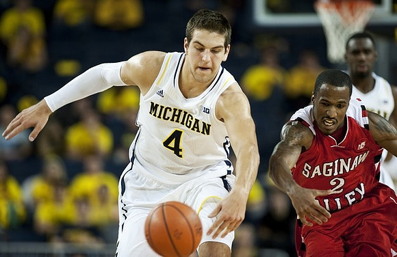 Mitch McGary (4) and Tim Hardaway Jr. (10)