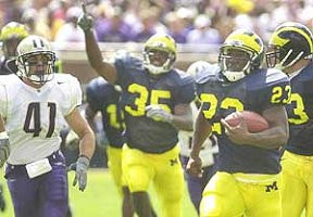Chris Perry (23) and B.J. Askew (35)