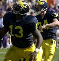 Larry Stevens (13) and Phillip Brabbs (34)