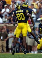 Braylon Edwards (80) and Julius Curry (26)