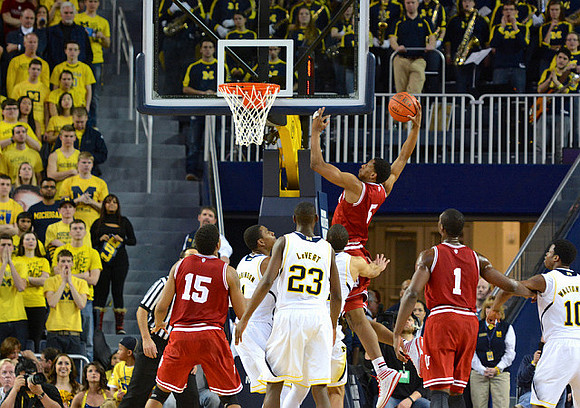 Glenn Robinson III (1), Caris LeVert (23), and Derrick Walton Jr. (10)
