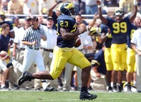 Chris Perry (23) and Pierre Woods (99)
