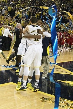 Glenn Robinson III (1) and Nik Stauskas (11)