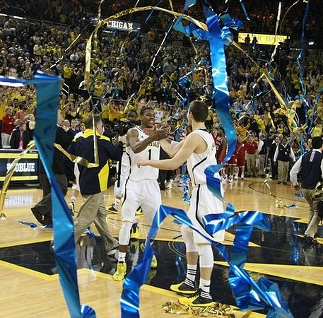 Glenn Robinson III (1) and Nik Stauskas (11)