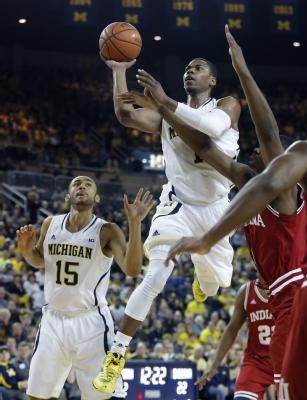 Jon Horford (15) and Glenn Robinson III (1)