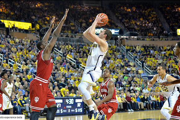 Nik Stauskas (11) and Jordan Morgan (52)