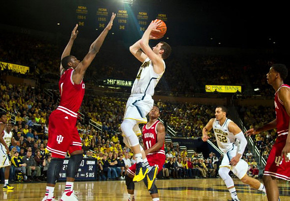 Nik Stauskas (11) and Jordan Morgan (52)