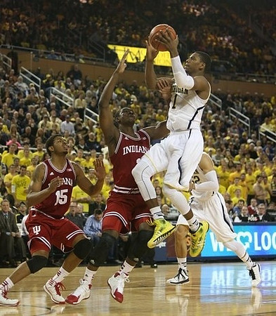 Glenn Robinson III (1) and Jordan Morgan (52)