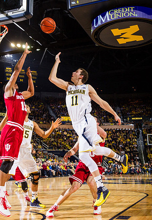 Nik Stauskas (11) and Jon Horford (15)