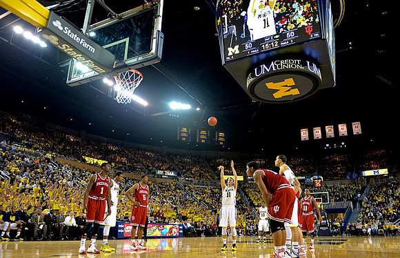 Glenn Robinson III (1), Nik Stauskas (11), and Derrick Walton Jr. (10)