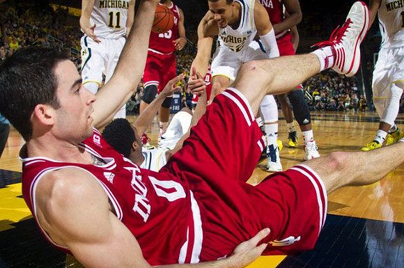 Nik Stauskas (11), Derrick Walton Jr. (10), and Jordan Morgan (52)