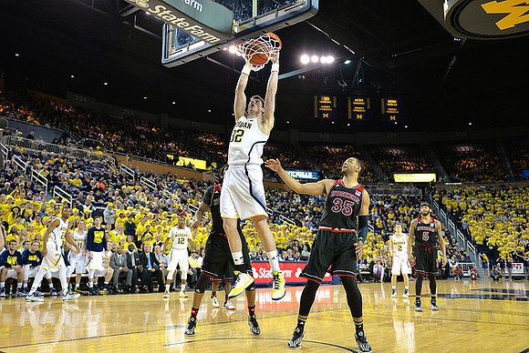 Zak Irvin (21), Muhammad-Ali Abdur-Rahkman (12), Ricky Doyle (32), and Spike Albrecht (2)