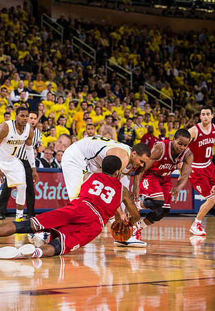 Glenn Robinson III (1) and Jordan Morgan (52)
