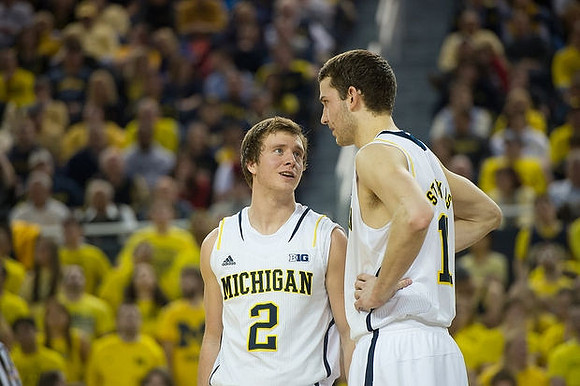 Spike Albrecht (2) and Nik Stauskas (11)
