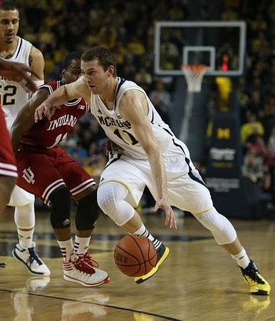 Nik Stauskas (11) and Jordan Morgan (52)