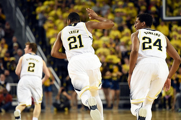 Spike Albrecht (2), Zak Irvin (21), and Aubrey Dawkins (24)