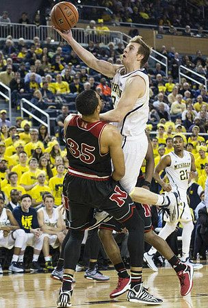Spike Albrecht (2) and Zak Irvin (21)