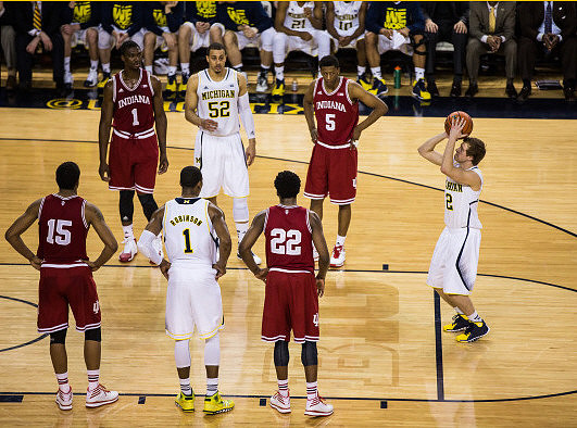 Glenn Robinson III (1), Jordan Morgan (52), and Spike Albrecht (2)