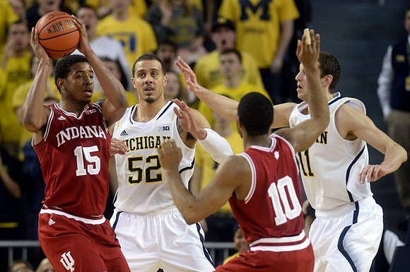 Jordan Morgan (52) and Nik Stauskas (11)