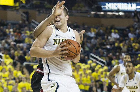 Max Bielfeldt (44), Zak Irvin (21), and Muhammad-Ali Abdur-Rahkman (12)