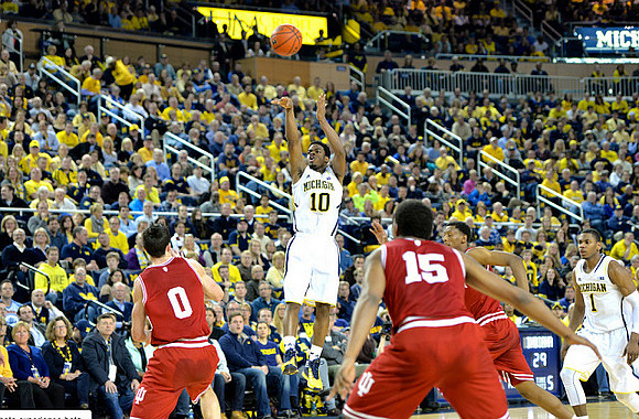 Derrick Walton Jr. (10) and Glenn Robinson III (1)