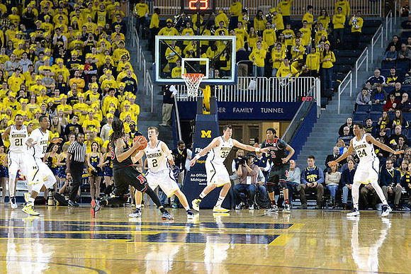 Zak Irvin (21), Muhammad-Ali Abdur-Rahkman (12), Spike Albrecht (2), Ricky Doyle (32), and Aubrey Dawkins (24)