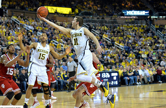 Jon Horford (15) and Nik Stauskas (11)