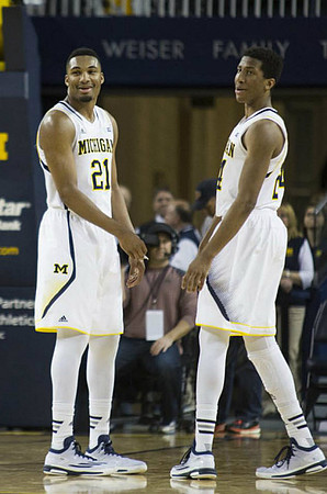 Zak Irvin (21) and Aubrey Dawkins (24)