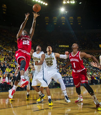 Derrick Walton Jr. (10) and Jordan Morgan (52)