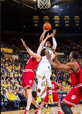 Glenn Robinson III (1) and Caris LeVert (23)