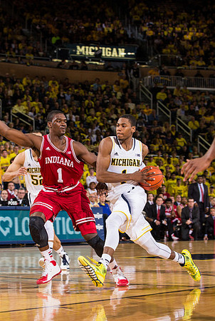 Glenn Robinson III (1) and Jordan Morgan (52)