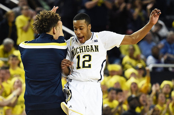 D.J. Wilson (5) and Muhammad-Ali Abdur-Rahkman (12)