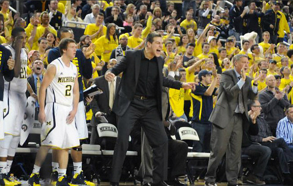 Zak Irvin (21), Spike Albrecht (2), Mitch McGary (4), and Jeff Meyer