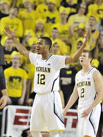 Muhammad-Ali Abdur-Rahkman (12) and Spike Albrecht (2)
