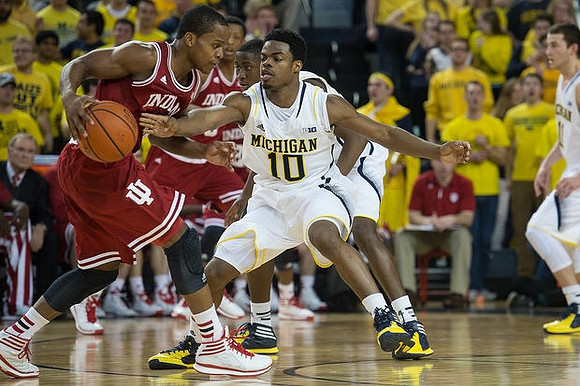 Derrick Walton Jr. (10) and Caris LeVert (23)