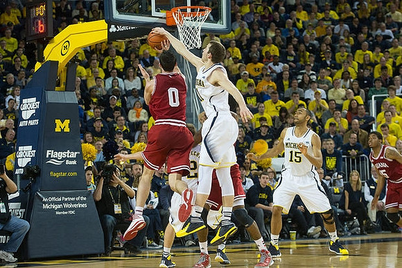 Nik Stauskas (11), Spike Albrecht (2), and Jon Horford (15)