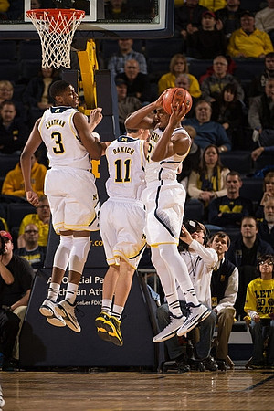 Kameron Chatman (3), Andrew Dakich (11), and Zak Irvin (21)