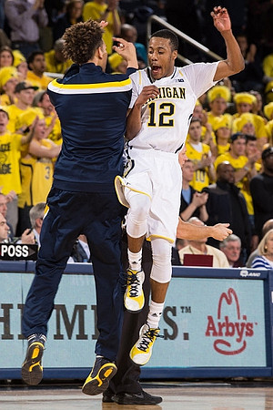 D.J. Wilson (5) and Muhammad-Ali Abdur-Rahkman (12)