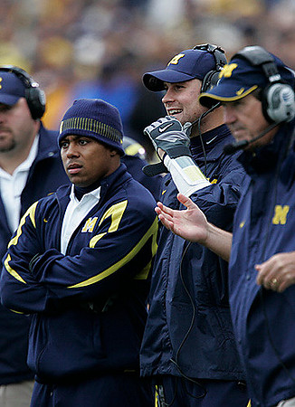 Glen Steele, Michael Hart, Chad Henne, and Lloyd Carr