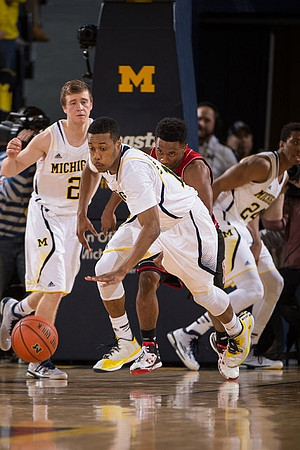 Spike Albrecht (2), Muhammad-Ali Abdur-Rahkman (12), and Aubrey Dawkins (24)