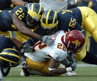 Obi Ezeh, Jamar Adams, and Brandon Graham