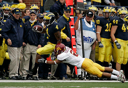 Brandon Minor, Lloyd Carr, Steven Threet, and Mark Moundros