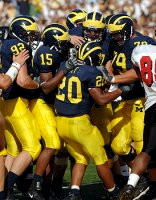 Michael Hart (20), Steve Breaston (15), Will Paul (92), and Adam Stenavich (79)