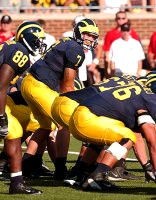 Chad Henne (7), Tim Massaquoi (88), Matt Lentz (67), and Mike Kolodziej (76)