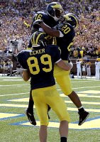 Adrian Arrington (16), Michael Hart (20), and Tyler Ecker (89)