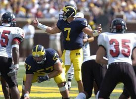 Chad Henne (7) and Adam Kraus (57)