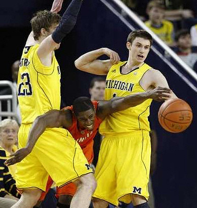 Evan Smotrycz (23) and Stu Douglass (1)