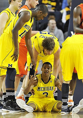 Matt Vogrich (13), Tim Hardaway Jr. (10), Trey Burke (3), Evan Smotrycz (23), and Stu Douglass (1)